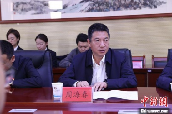 圖為西寧城市職業(yè)技術學院黨委書記周海春發(fā)言。青海省人民檢察院供圖